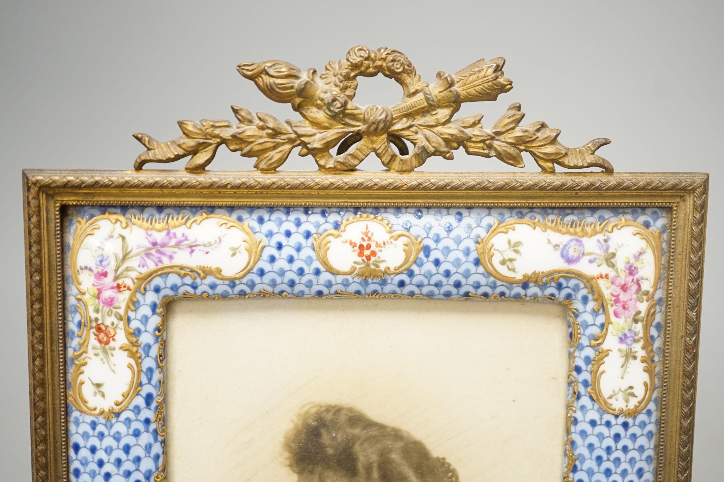 A late 19th century Dresden porcelain and ormolu mounted easel frame, height 23cm